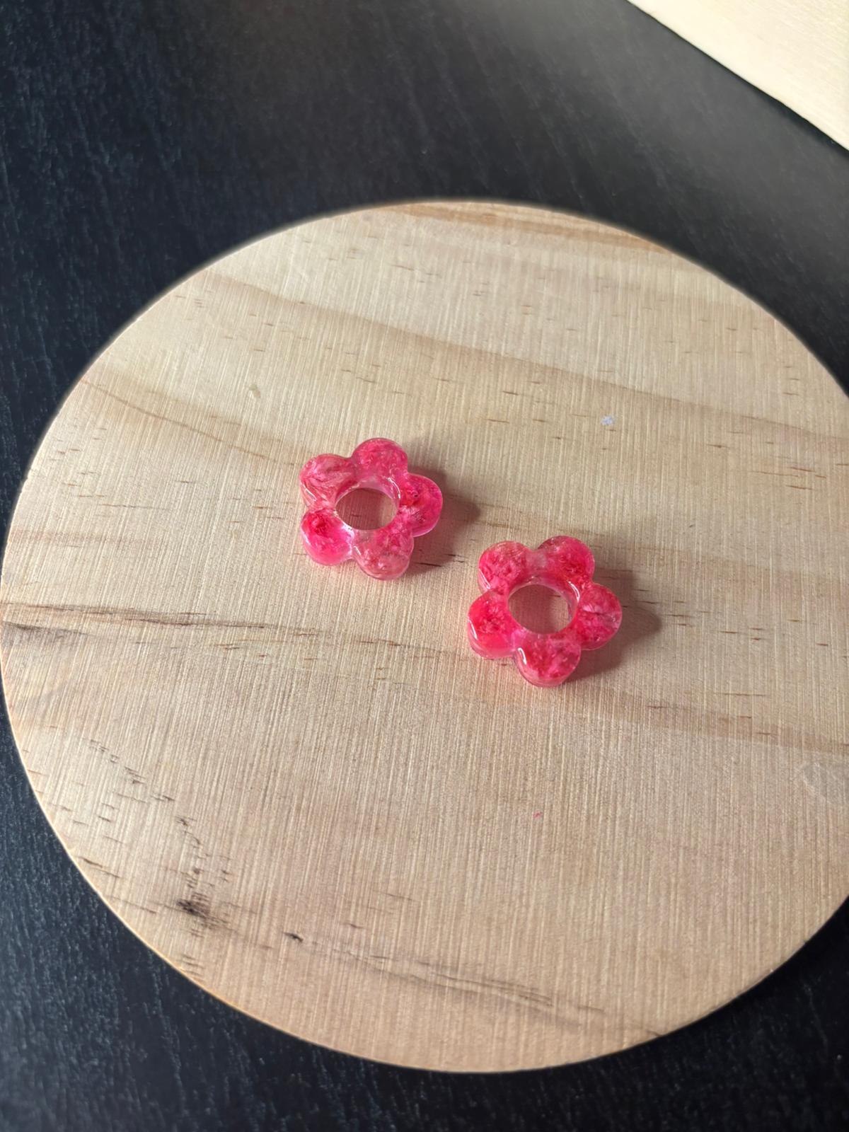 Pendientes de flores preservadas