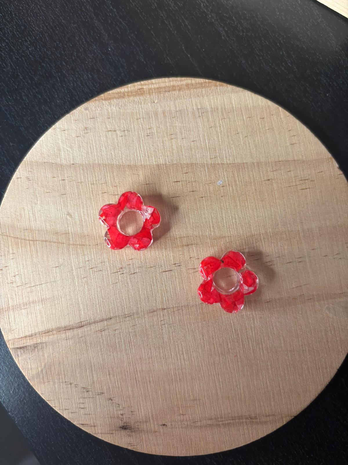 Pendientes de flores preservadas